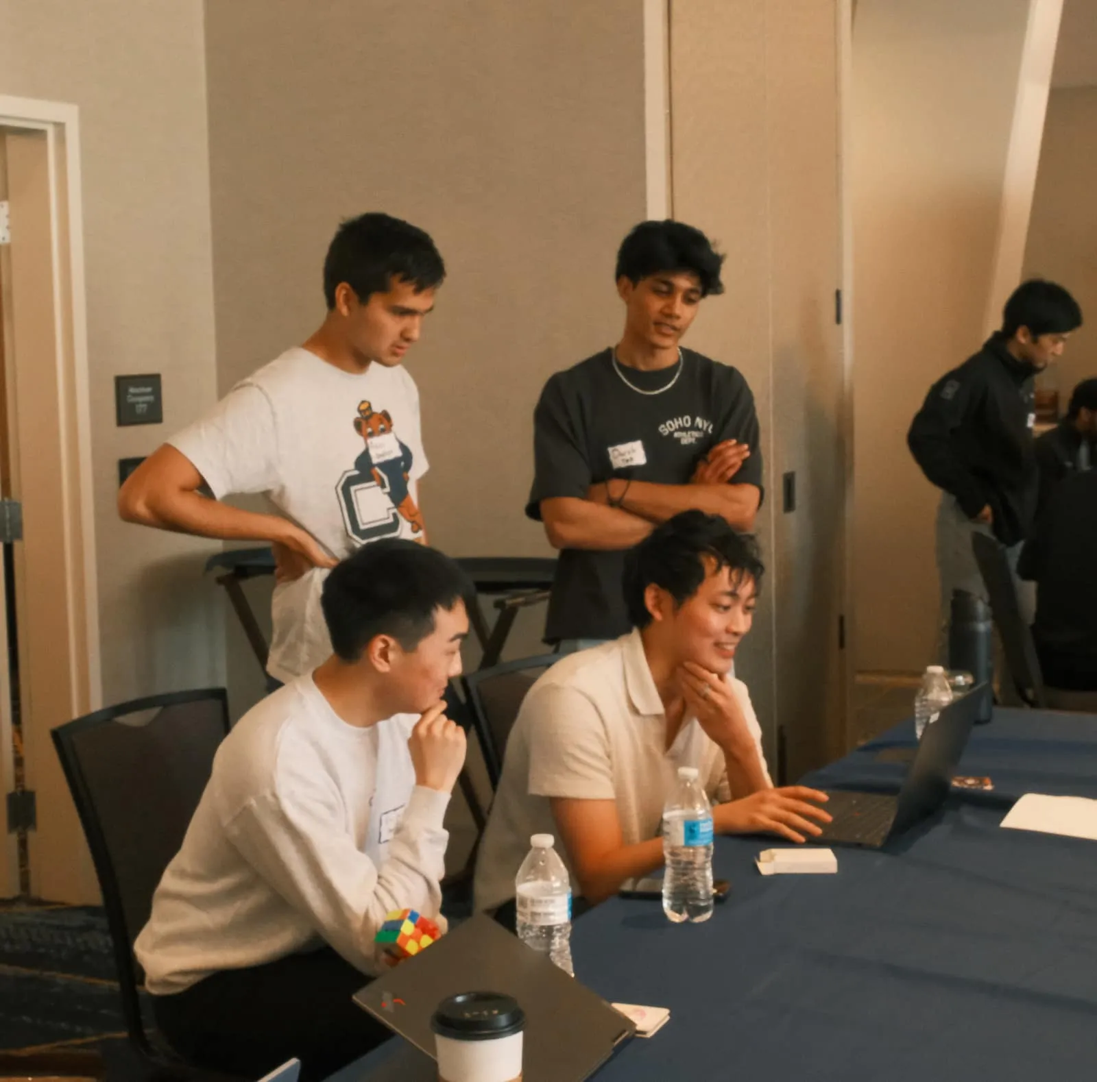 Participants at a table during the Berkeley Trading Competition